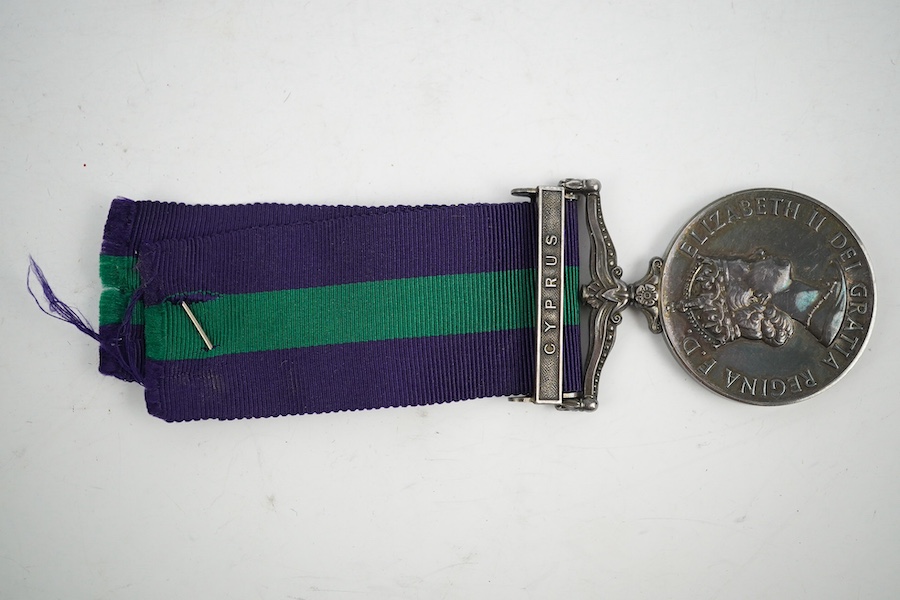 An ERII General Service medal, awarded to 14473980 SGT. D.W. Tedder. R.A., with a clasp for Cyprus. Condition - fair to good.